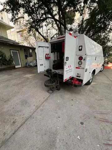 Magnet Plumbing service vehicle on-site for Water Heater Repair in Post Oak Village